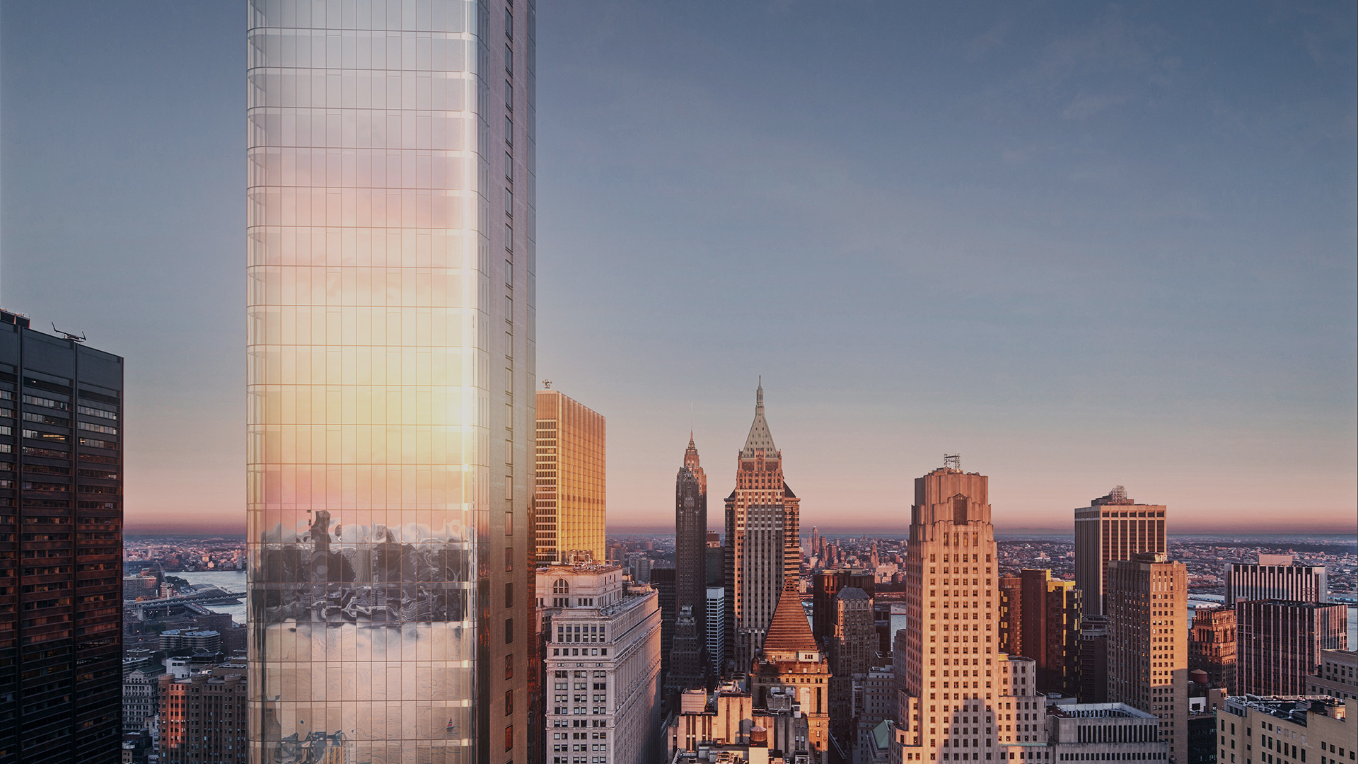 The Greenwich by Rafael Vi&ntilde;oly at 125 Greenwich Street, seen above the Lower Manhattan skyline at sunset